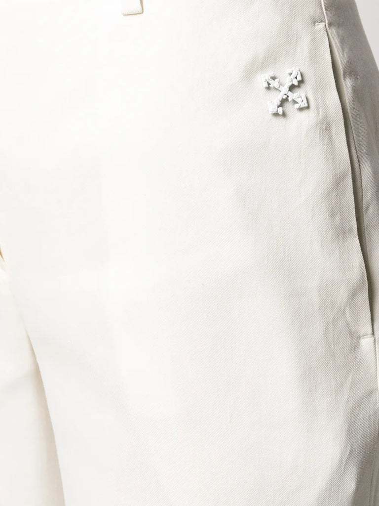 flared curved cuff trousers