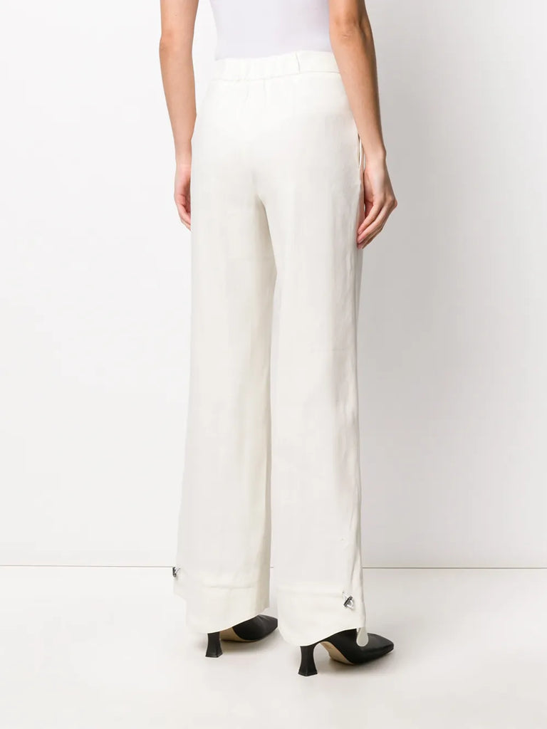 flared curved cuff trousers