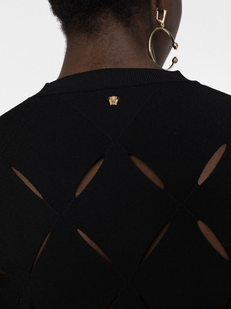 Cut-out knitted jumper