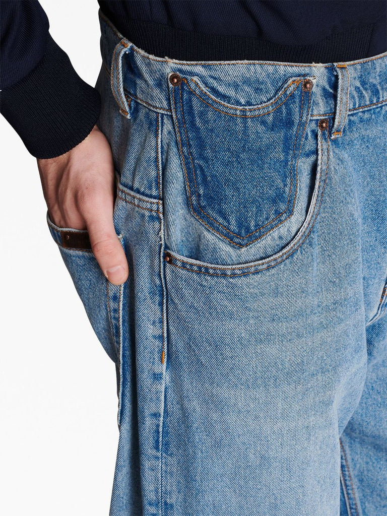 Denim džinsi ar kontrasta kabatām platām kājām