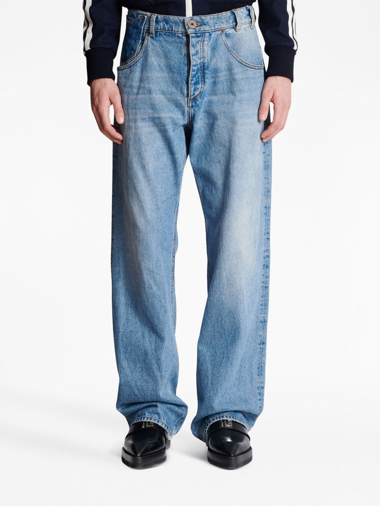 Denim džinsi ar kontrasta kabatām platām kājām