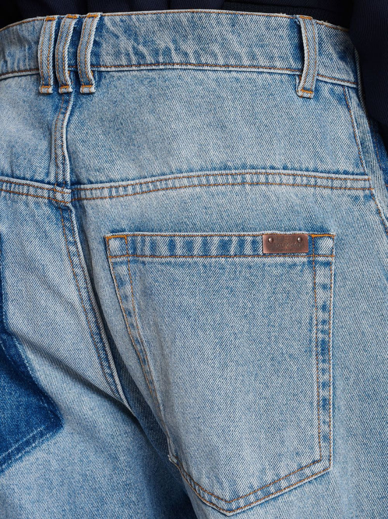 Denim džinsi ar kontrasta kabatām platām kājām