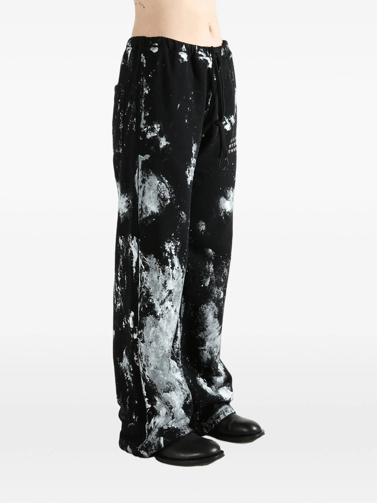 paint-splatter logo-print track pants