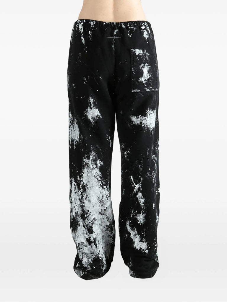paint-splatter logo-print track pants