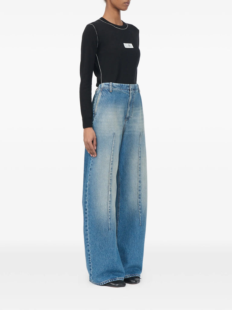 faded pleated jeans