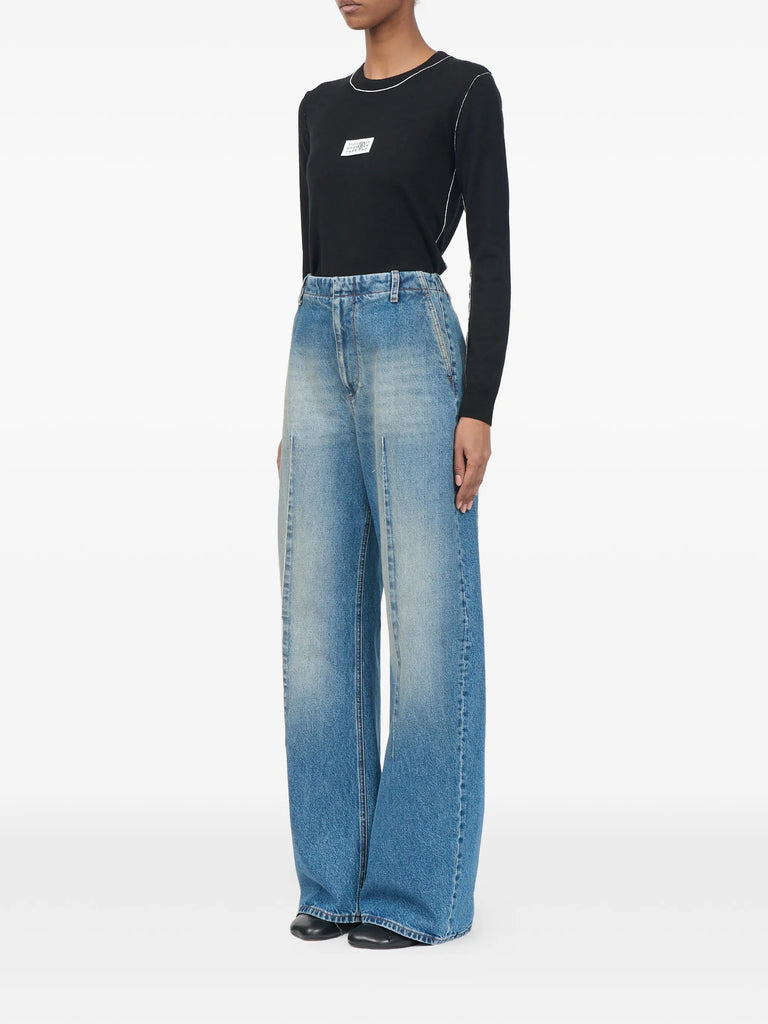 faded pleated jeans