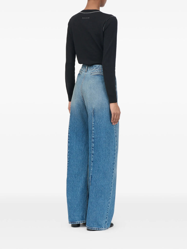 faded pleated jeans