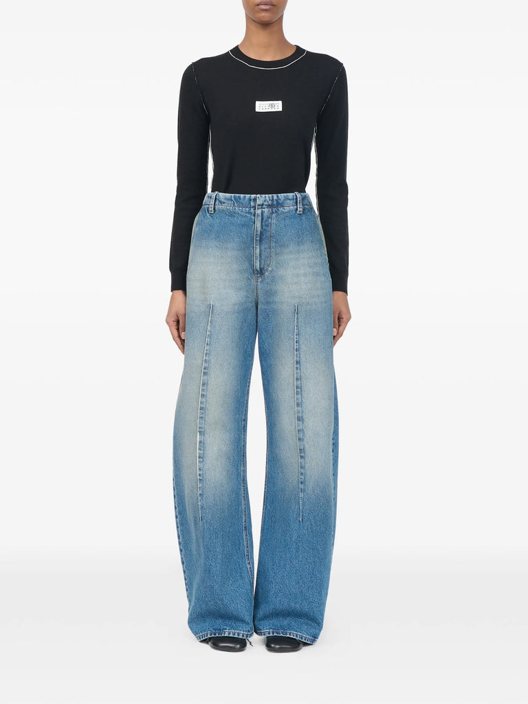 faded pleated jeans