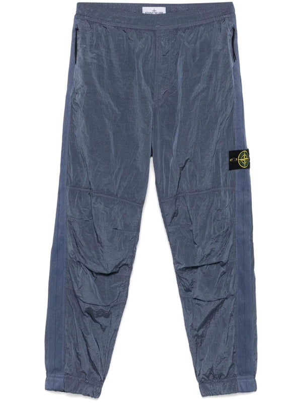 Compass-badge track trousers