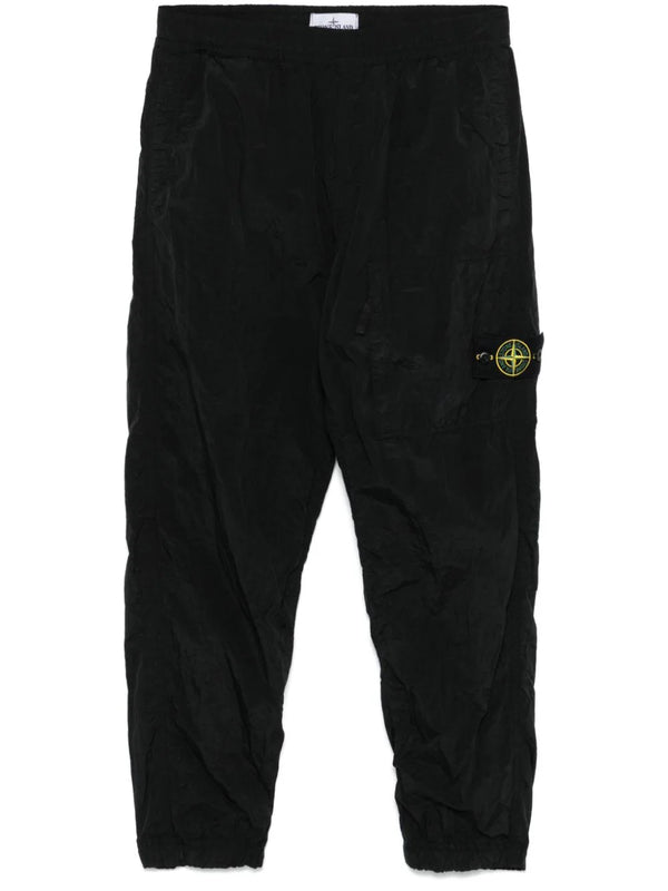 Compass-badge trousers