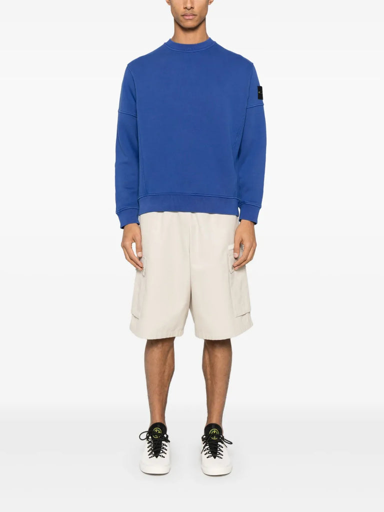 Sweatshirt mit Kompass-Aufnäher 