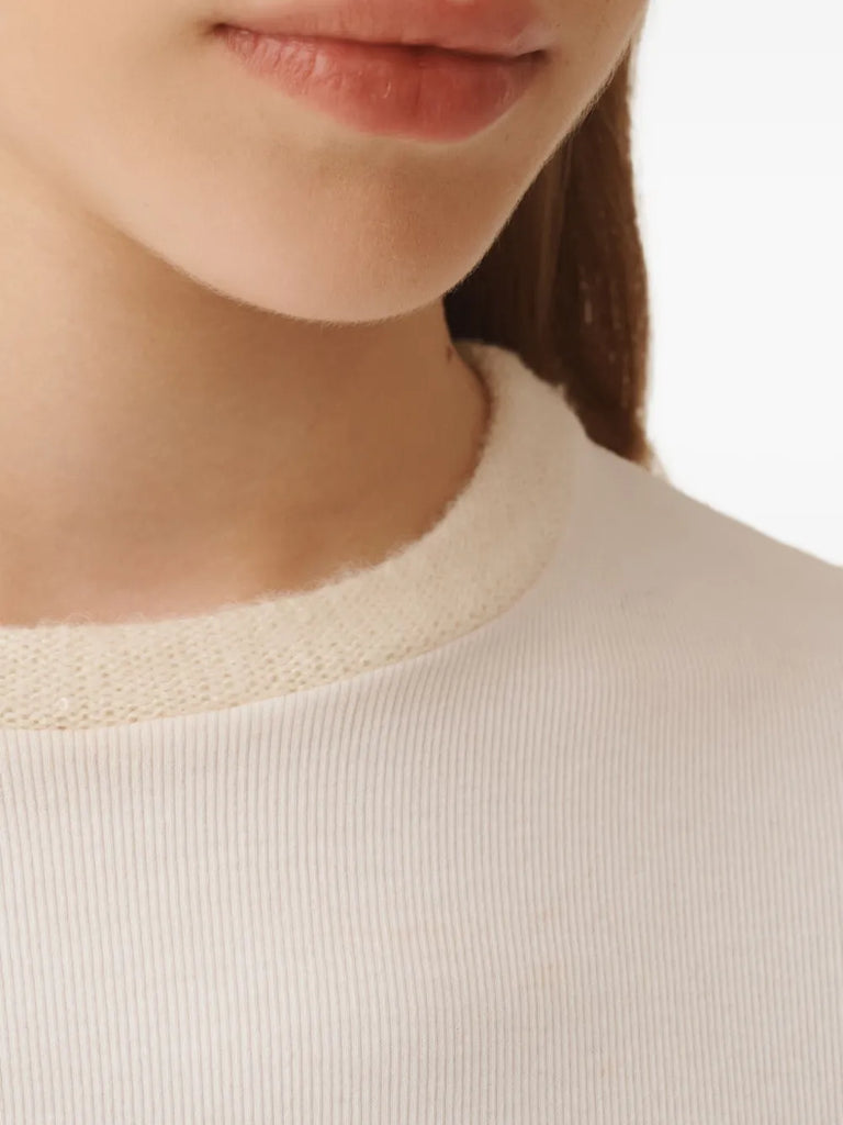 embellished-neckline top
