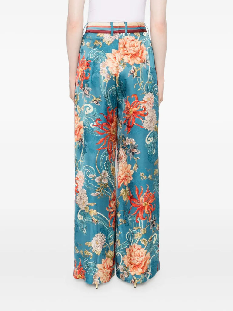 floral-print pleated trousers