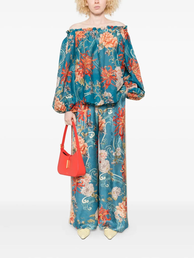 floral-print pleated trousers