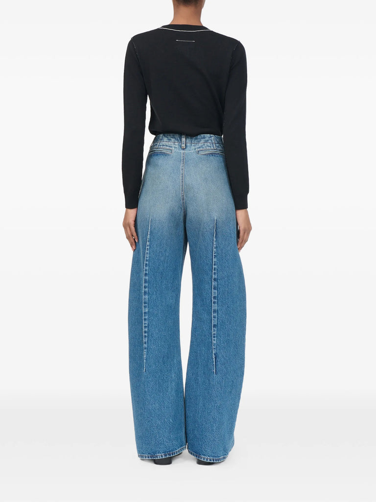faded pleated jeans