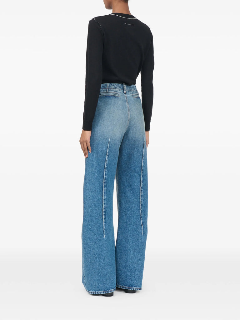 faded pleated jeans